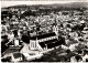 En Avion Au-dessus De Les Mureaux (Seine Et Oise > Yvelines) L’église Vue Générale - Les Mureaux