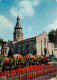 03 - Néris Les Bains - L'Eglise - Fleurs - Automobiles - CPM - Voir Scans Recto-Verso - Neris Les Bains