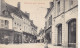 36. CHÂTILLON SUR INDRE.  CPA . RUE GRANDE.. ANIMATION. COMMERCES. ANNEE 1909 + TEXTE - Autres & Non Classés