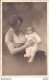 CARTE PHOTO NON IDENTIFIEE REPRESENTANT UNE FEMME AVEC UN BEBE STUDIO ETIENNE LE GRAND RUE RENE MADEC QUIMPER - Te Identificeren