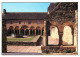 12 - Conques En Rouergue - Le Jardin Du Cloître Depuis Les Deux Arcades épargnées De La Galerie Est - CPM - Voir Scans R - Autres & Non Classés