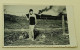 A Pretty Girl By The Fence As A Steam Locomotive Passes Behind - Personnes Anonymes