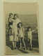 Two Little Girls, A Boy And A Woman By The Sea - Anonymous Persons
