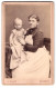 Fotografie H. Ranft, Dresden, Marienstr. 12, Portrait Stolze Mutter Im Kleid Hält Blonde Tochter Im Arm  - Anonyme Personen