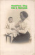 R420644 A Woman In A White Blouse With A Small Child. A. Simpson - World