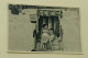 A Little Girl And A Woman In A Deckchair On The Beach - Anonymous Persons