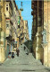 MALTE - A Typical Street In Valletta - Animé - Colorisé - Carte Postale - Malta
