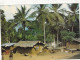 COTE D'IVOIRE..  CPSM. .VILLAGE TYPIQUE. ANNEE 1983 + TEXTE ENVOYE DE ABIDJAN - Côte-d'Ivoire