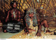 AFRICAN LIFE - Inside His Reed Hut A Sangoma ....prepares To Read The Future In A Throw Of Shells - South Africa