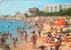Espagne - Espana - Cataluna - Costa Brava - Playa De Aro - Playa - Plage - Femme En Maillot De Bain - Immeubles - Archit - Gerona