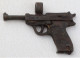 Delcampe - PENDANT Pistol WW2 WwII WW1 WwI GUN German Parabelum Bronze 43x31x7 Mm 13.62 G - Decorative Weapons