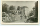 A Localiser - Carte-Photo - Couple En Vélos Parmi Des Ruines De Maison - To Identify