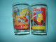 O20 ( 6 ) / Lot De 2 Verres De Collection - Amora - Les Simpsons - 1997 Et 1998 - Advertisement