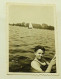 A Young Girl Is Swimming In A Lake - Anonymous Persons