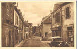 23 - CREUSE - AUZANCES - CENTRE VILLE - RUE St JACQUES - BOUTIQUES - VOITURE - Auzances