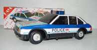 ANTIGUO COCHE POLICIA DE PAYA - MODELO VOLKSWAGEN PASSAT - DE HOJALATA LITOGRAFIADA A PILAS -. CON SU CAJA ORIGINAL - - Oud Speelgoed