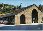 Carte Postale 38 De Crémieu - La Tour St Hippolyte, La Tour De L'horloge Et Les Halles - Crémieu