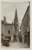 123 B / CPA  PARTHENAY  LA GRANDE RUE ET L' EGLISE SAINT LAURENT - Parthenay