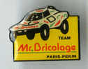 {48688} Pin´s " Team Mr Bricolage Paris Pekin ( Voiture ) " , TBE. - Rallye