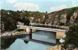 CPA ANIMEE. CROZANT. LA CREUSE, LE NOUVEAU PONT, LES RUINES. - Crozant