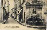 Carte Postale Ancienne Saint Rémy De Provence - Rue Carnot Et Fontaine Nostradamus - Saint-Remy-de-Provence