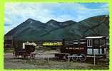 YOKON Tranportation Old And New. "Duchess " Train Engine. And The Stagecoach On View At Carcross. CANADA Diligence - Yukon