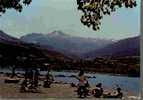 CPSM. LA PLAGE DU PLAN D'EAU D'EMBRUN. AU FOND, LA CHAINE DES ORRES. DATEE 1987. - Embrun