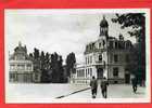 LAIGLE 1952 POSTE ET SALLE DES FETES STAND DES COMMERCANTS SINISTRES CARTE PHOTO EN BON ETAT - L'Aigle