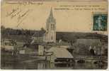 Beaumontel - Vue De L' Eglise Et Du Village - Beaumont-le-Roger