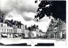 Cpsm BEAUGENCY Place Du Martroi Et Monument Aux Morts - Commerces MOUSSET BOUVET  -estel 1402 - Beaugency