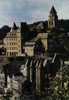 CPSM.  UZERCHE. LE CLOCHER DE L'EGLISE SAINT PIERRE DEVANT LE CHATEAU PONTIER. - Uzerche