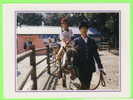 HAMURA,TOKYO, JAPON - PONY RIDING IN HAMURA ZOOLOGICAL PARK - ANIMATED - - Tokio