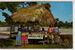 SEMINOLE INDIAN FAMILY AT THE AQUAGLADES SHOW PLACE OF THE EVERGLADES FORT LAUDERDALE FLORIDA - Fort Lauderdale