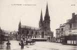 Carte 1910 LA DELIVRANDE - LA BASILIQUE ET LA PLACE-MARCHE - La Delivrande