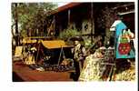 Mexican Merchant Displays Wares In Front Of Historic Avila Adobe Olvera Street, Los Angeles, California - Los Angeles