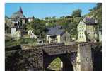 CPM De Treignac   Aperçu Sur Le Vieux Pont Et L Eglise XII Et XIV ème - Treignac