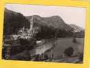 - 11445 - LOURDES -  La Basilique Et Le Gave -  Flamme, Timbre.  65 - Lourdes