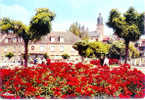 61.  PUTANGES-PONT-ECREPIN. VILLAGE FLEURI. "HÔTEL RESTAURANT DU LION VERT". L'EGLISE. - Putanges