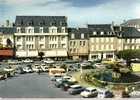 CPSM. GUERET. PLACE BONNYAUD. L'HOTEL ST FRANCOIS. (GRAND CAFE ET QUINCAILLERIE. VOITURES). - Guéret