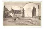 Delcampe - BASTENAKEN - BASTOGNE .Monument Aux Morts De La Ville Et Le Séminaire - Bastogne