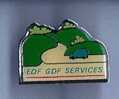 Pin's EDF GDF Services,paysage,montagne,collines,voiture Bleu,électricité,gaz - EDF GDF