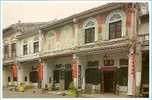 THESE OLD SHOP HOUSES IN MALACCA SHOW AN EXAMPLE OF TYPICAL OLD CHINESE ARCHITECTURAL CONSTRUCTION. - Malaysia
