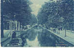 DELFT HOLLAND Vrouwjuttenland SHOPS Canal BOAT And BRIDGE Circa - 1910 - Delft