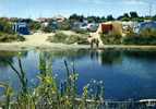 CPM DU 34 MARSEILLAN PLAGE BORD DU CANAL ET CAMPING ANIME  VOIR SCANER - Marseillan