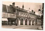 Nérondes (18) : La Mairie Le Magasin De Nouveautés Confection Bassot Environ 1950 (animée). - Nérondes