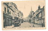 Neufchâtel-en-Bray (76) : La Grande Rue Fausse Portre , Hôtel Du Grand Cerf Avant Le 7/06/40  En 1941 (animée). - Neufchâtel En Bray