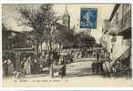 Carte Postale Ancienne Sétif - La Rue D'Isly Et L'Eglise - Sétif