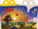 ASTERIX. EMBALLAGE McDonald's Happy Meal. 1994. POUR LES 35 ANS D'ANNIVERSAIRE D'ASTERIX. Le Village - Advertisement