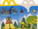 ASTERIX. EMBALLAGE McDonald's Happy Meal. 1994. POUR LES 35 ANS D'ANNIVERSAIRE D'ASTERIX. La Camp Indien. - Advertentie