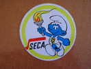 SCHTROUMPF SMURF Jeux Olympiques  Autocollant    Sticker  Pub SECA - Stickers